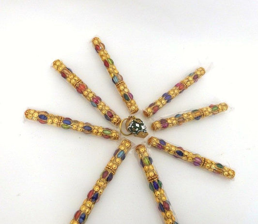 Bolígrafo dorado de la India