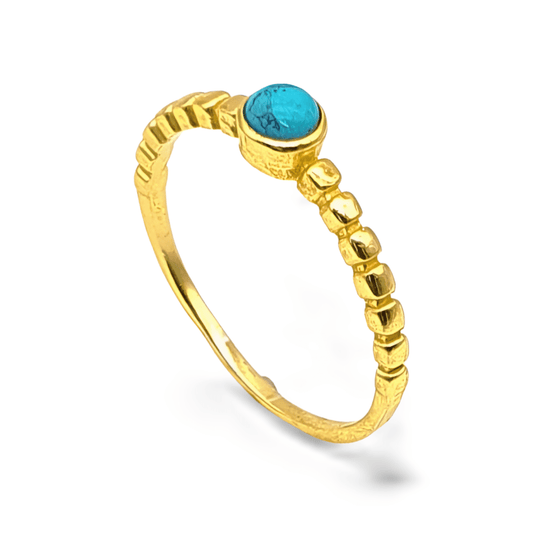 Anillo de plata dorada con turquesa