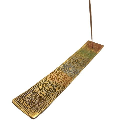 Incensario de metal dorado con los chakras