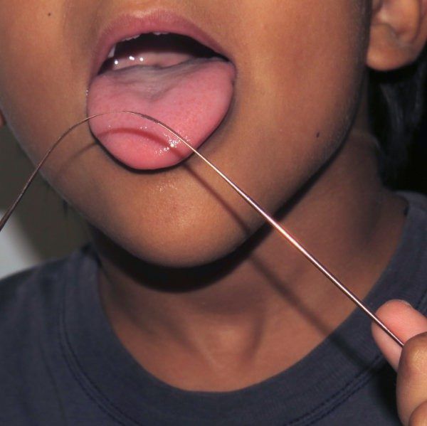 Raspador de lengua ayurvédico de cobre