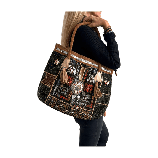 Bolso bohemio de piel con abalorios