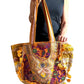Bolso bohemio amarillo con pompones
