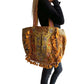 Bolso bohemio amarillo con pompones