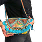 Bolso bohemio bandolera de patchwork con pompones
