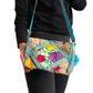 Bolso bohemio bandolera de patchwork con pompones