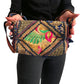 Bolso bohemio bandolera de patchwork con pompones