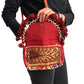 Bolso bohemio bandolera de patchwork con pompones