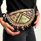 Bolso bohemio bandolera de patchwork con pompones