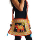 Bolso bandolera indio naranja con pompones