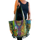 Bolso bohemio verde con pompones
