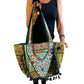 Bolso bohemio verde con pompones