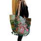 Bolso bohemio verde con pompones