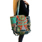 Bolso bohemio verde con pompones