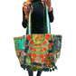 Bolso bohemio verde con pompones