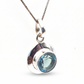Colgante de plata con topacio azul