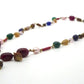 Collar de bisutería con minerales y rudraksha