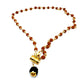 Collar de bisutería con rudraksha, cristal y tridente de Shiva