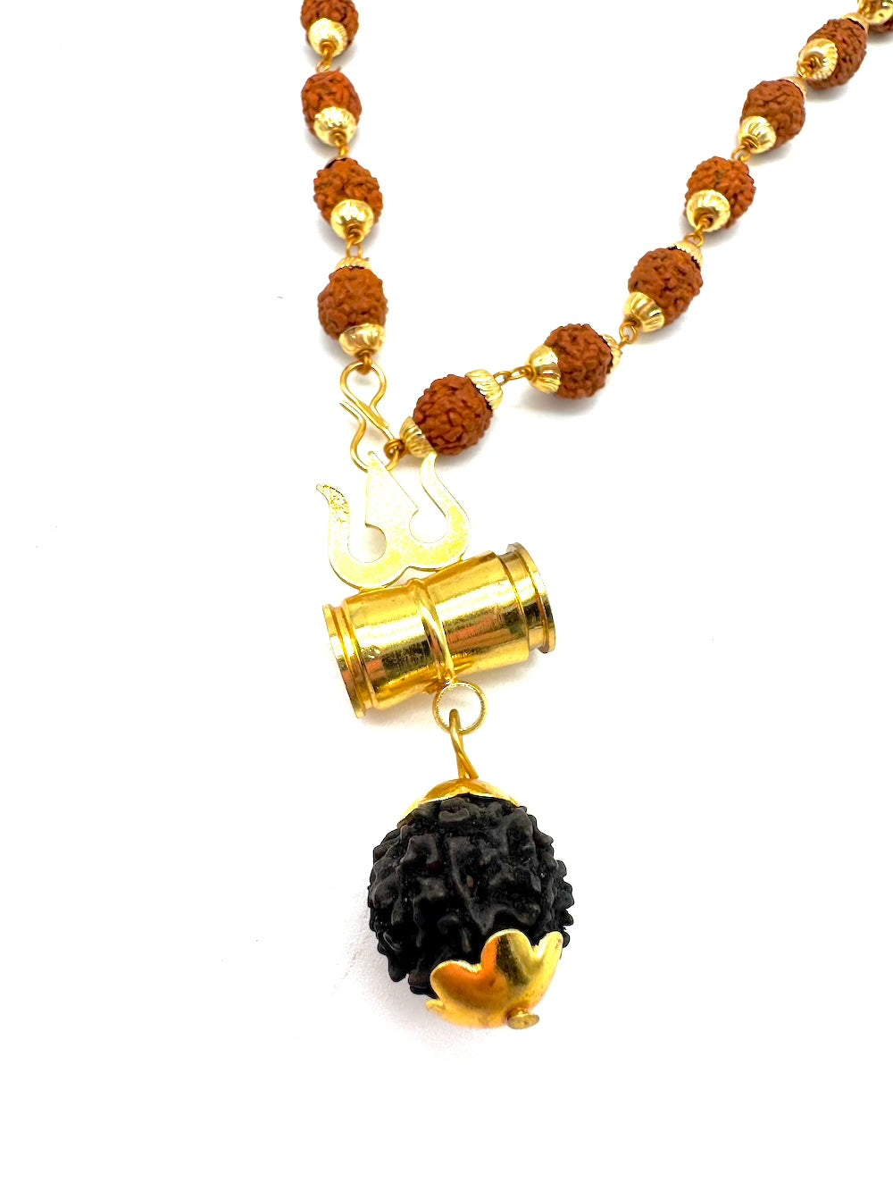 Collar de bisutería con rudraksha, cristal y tridente de Shiva