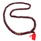 Mala budista de madera roja